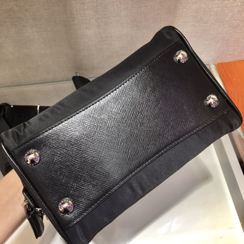 Pra*a top handle bags